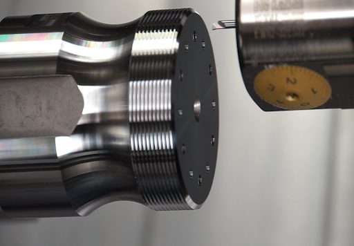  A precision boring bar in a CNC lathe setup for micro-machining hard materials with optimal rigidity and vibration control.