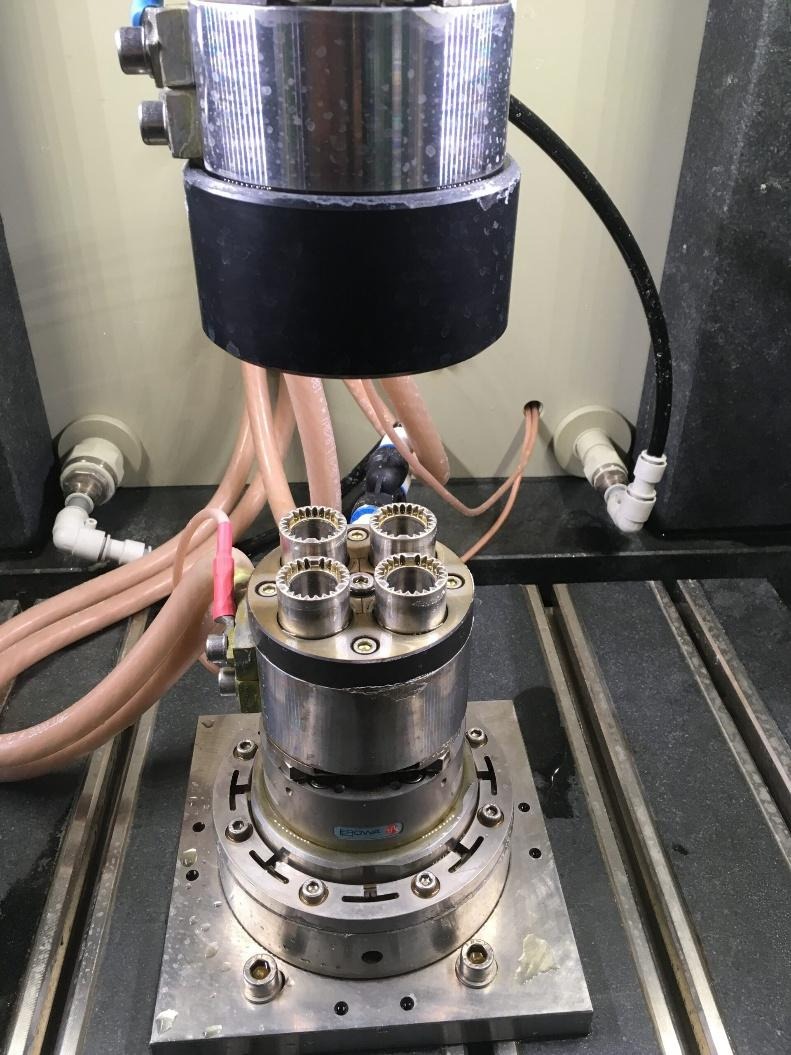 PEM electrochemical machining process showing cathode tool and multi-cavity workpiece setup in industrial machine